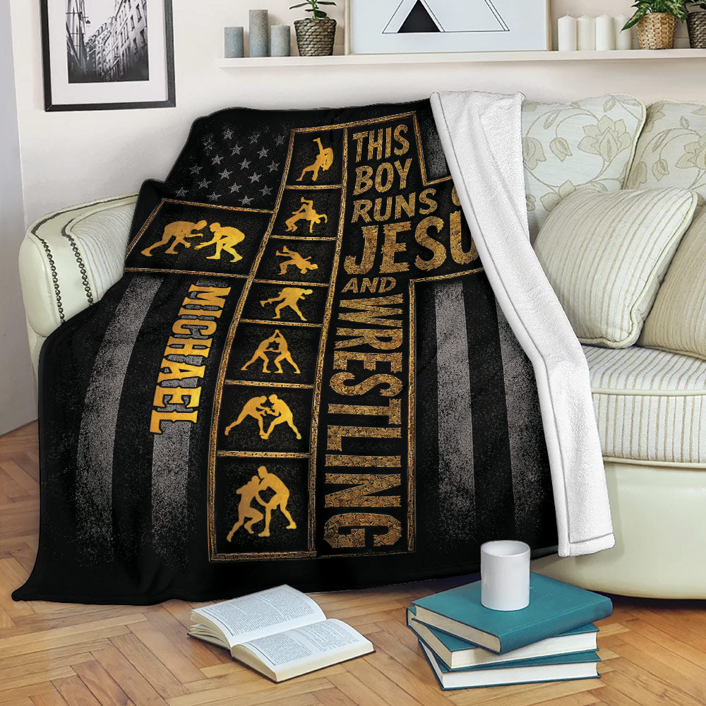 Wrestling throw blanket displayed on a sofa with black and gold grappling artwork