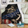 Wrestling throw blanket displayed on a sofa with vintage wrestler artwork and patriotic colors