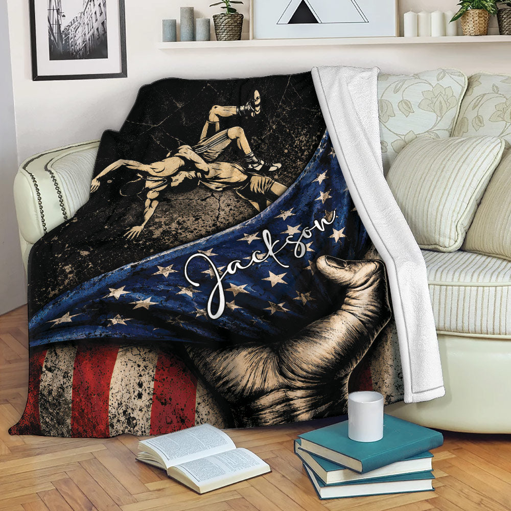 Wrestling throw blanket displayed on a sofa with vintage wrestler artwork and patriotic colors