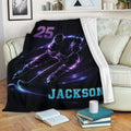 Custom hockey blanket displayed on a sofa with glowing purple and blue ice hockey artwork