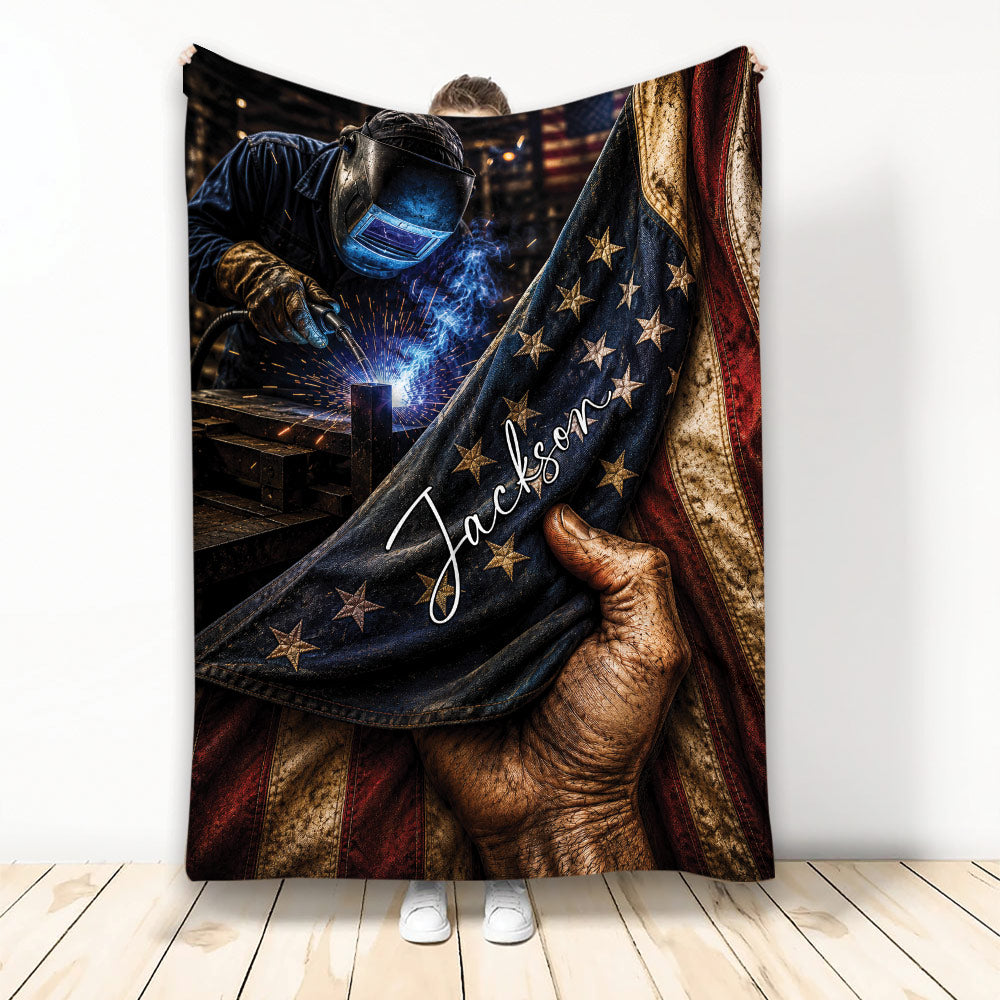 Welder throw blanket featuring a protective welding helmet, bright sparks, patriotic stars, and rugged flag-inspired artwork