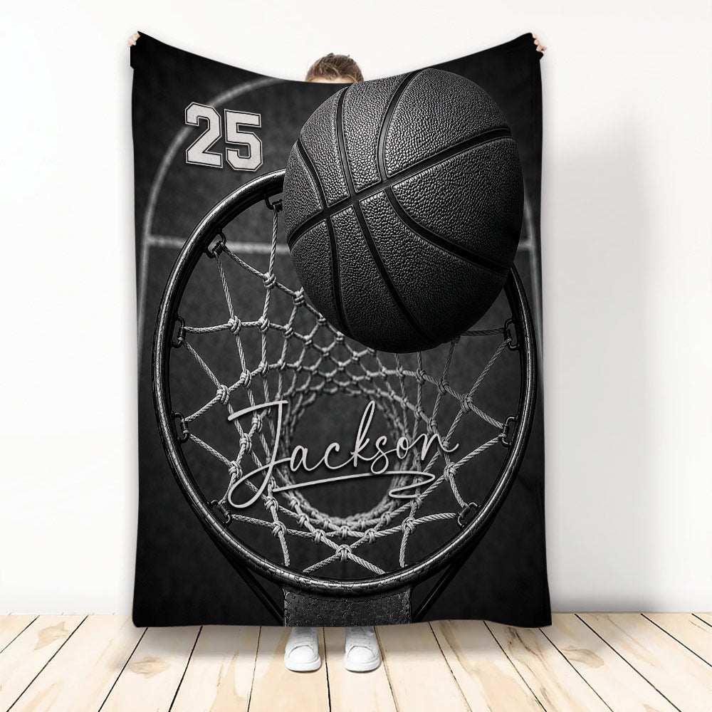 Basketball throw blanket featuring a dramatic close-up ball, hoop, net, and monochrome court artwork