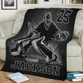 Hockey goalie blanket displayed as bold sports decor in a living room