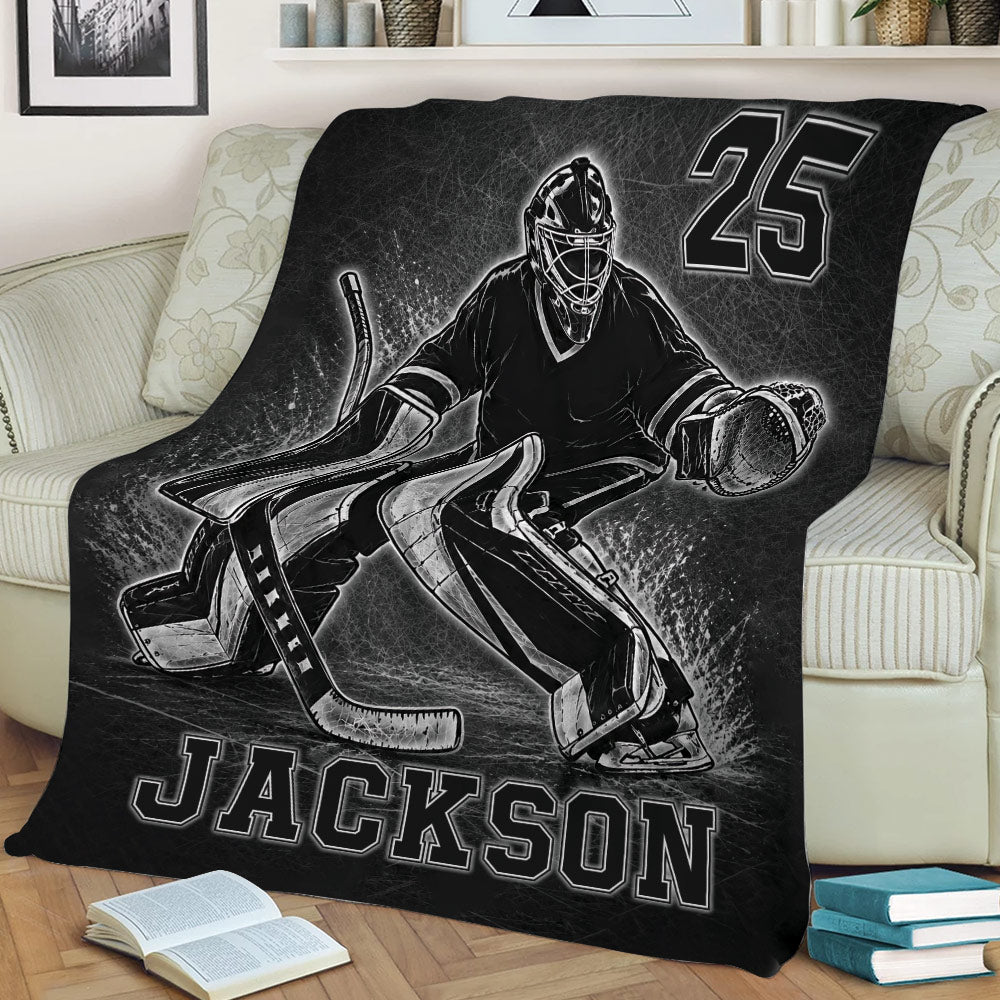 Hockey goalie blanket displayed as bold sports decor in a living room