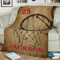 Close view of a basketball hoop and net design on a vintage-style throw blanket