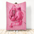Pink breast cancer awareness throw blanket featuring boxing gloves and a pink ribbon design