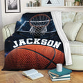 Basketball throw blanket draped over a sofa with hoop and court artwork in a cozy living room