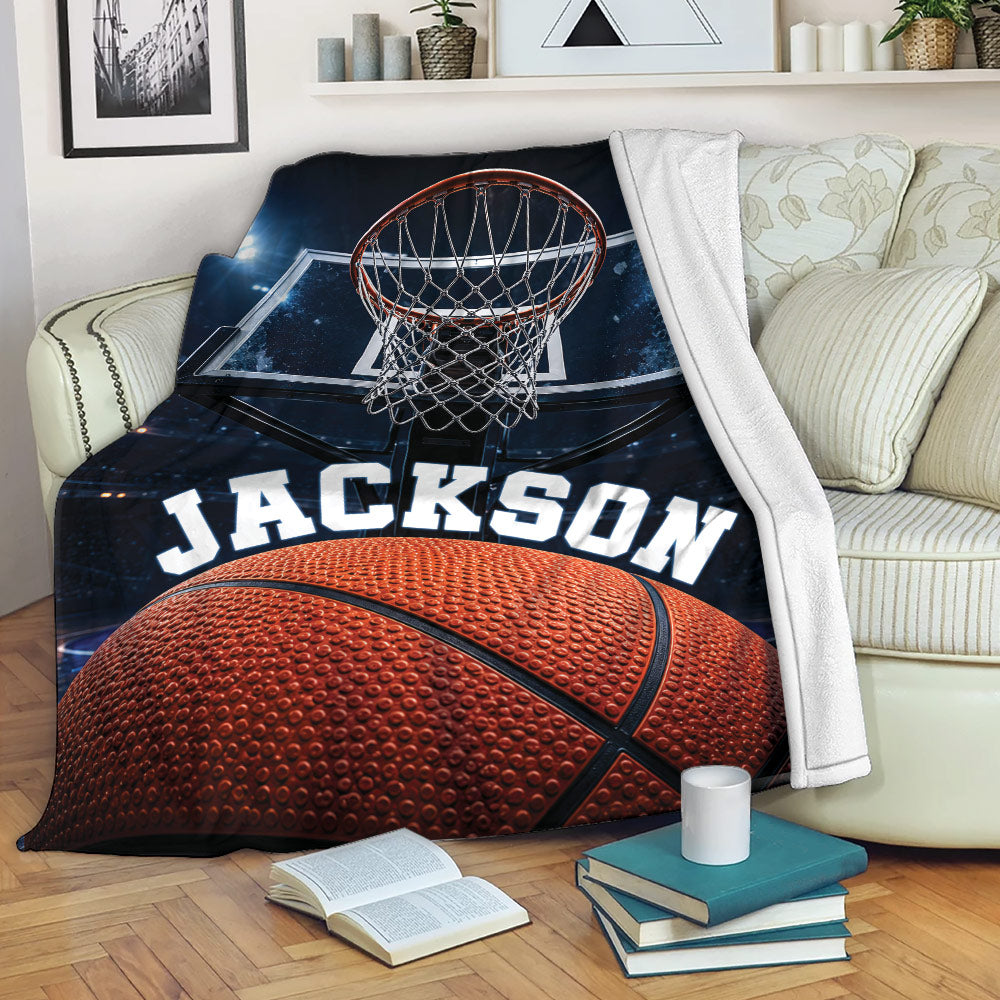 Basketball throw blanket draped over a sofa with hoop and court artwork in a cozy living room