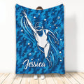 Blue swimming throw blanket featuring an underwater swimmer and dynamic water artwork