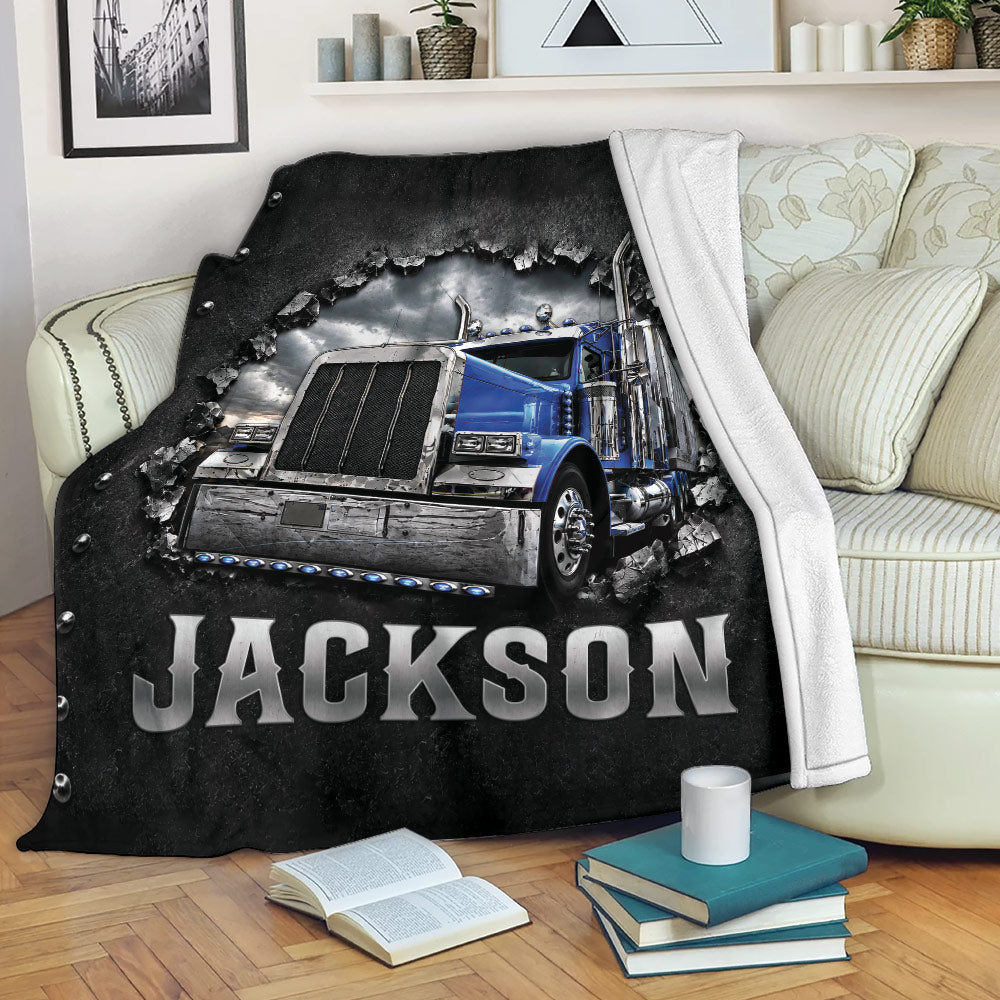 Blue semi truck throw blanket displayed on a sofa in a cozy living room