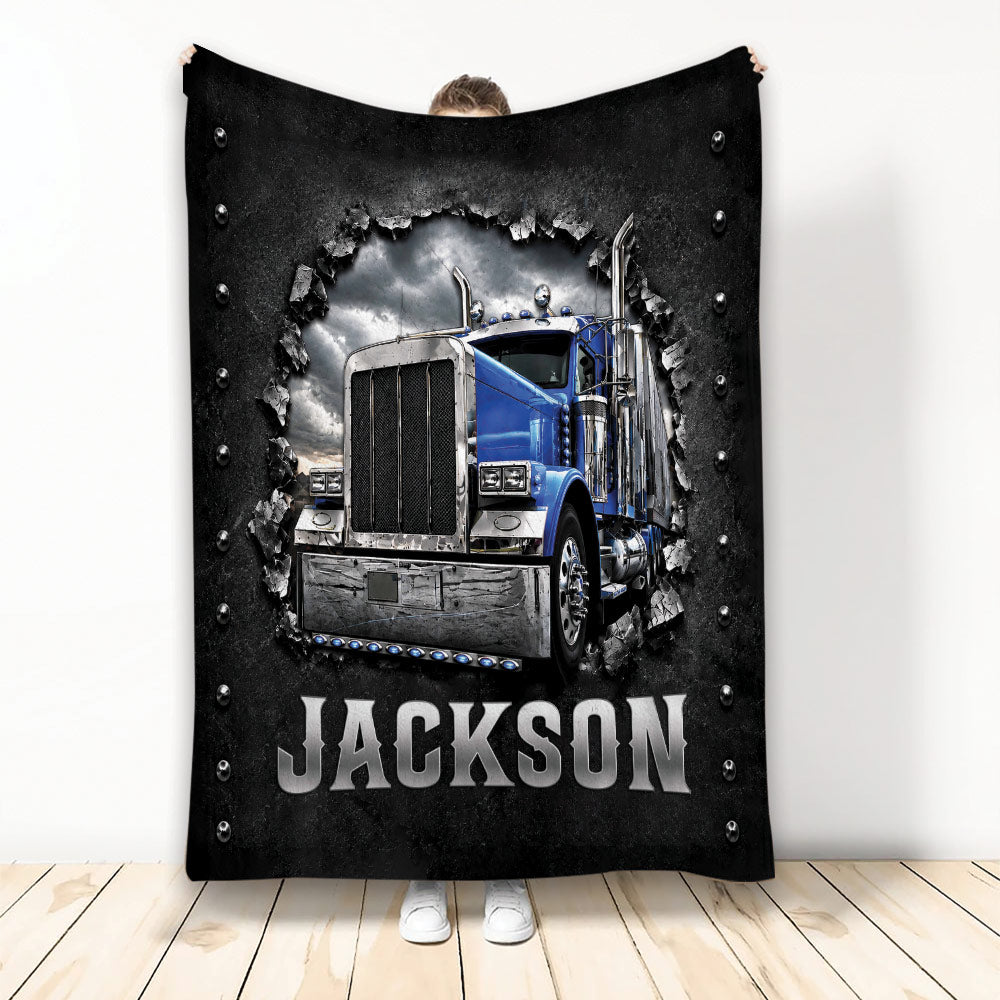 Trucker blanket featuring a blue semi truck bursting through a rugged black background