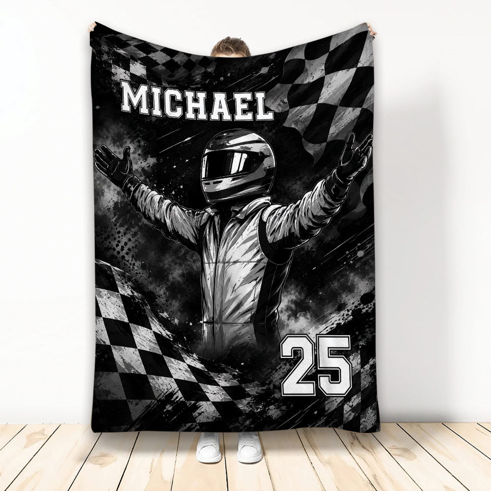Custom racing blanket featuring a helmeted driver, dramatic black and white artwork, and checkered flags