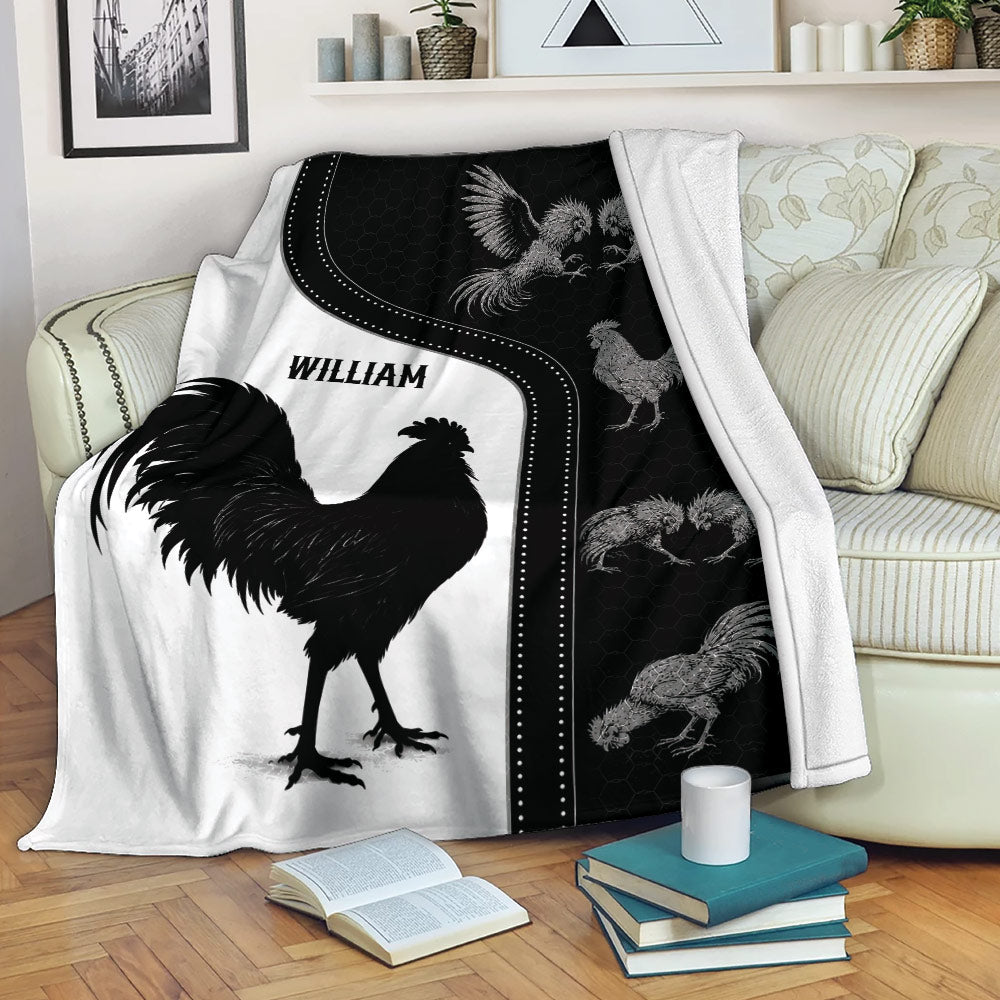 Chicken throw blanket draped over a sofa with bold black and white rooster artwork