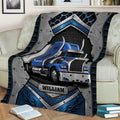 Close view of a blue semi truck Throw Blanket with metallic panels and bold automotive artwork