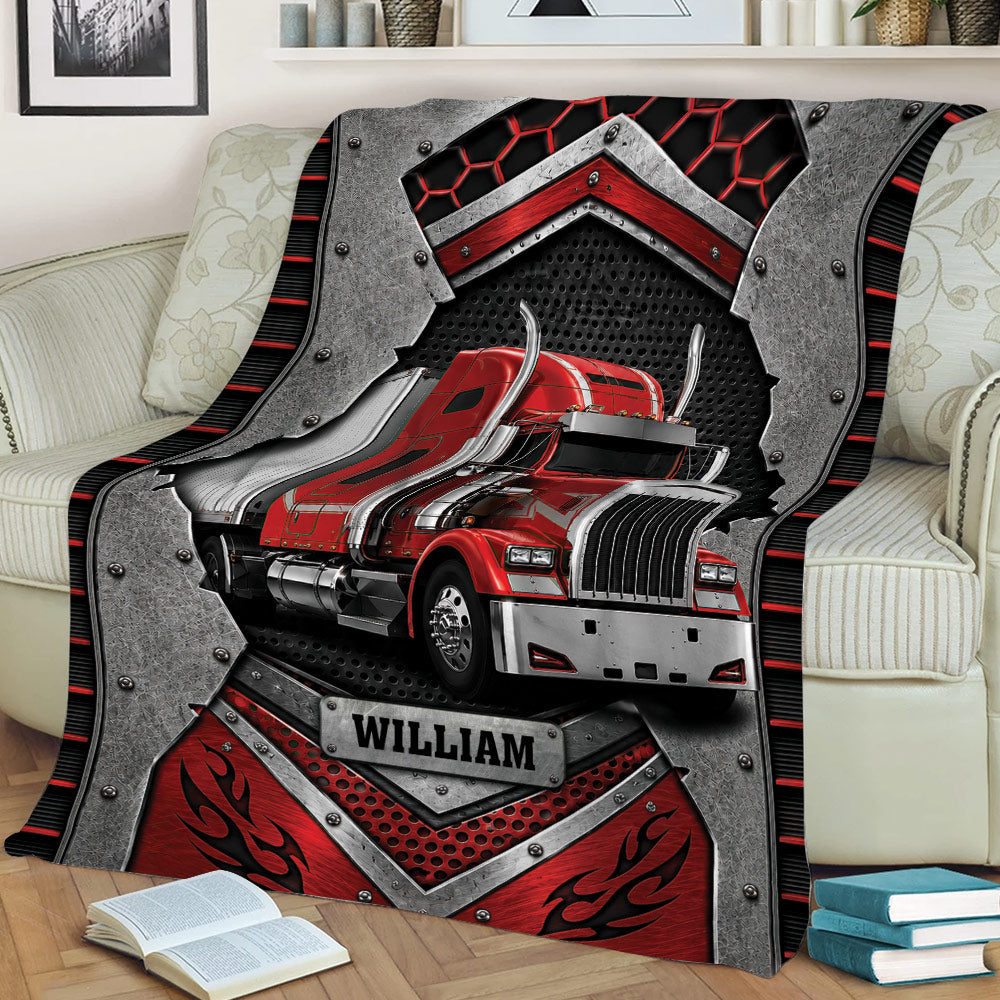 Trucker throw blanket draped across a sofa, featuring a red semi truck and rugged automotive design