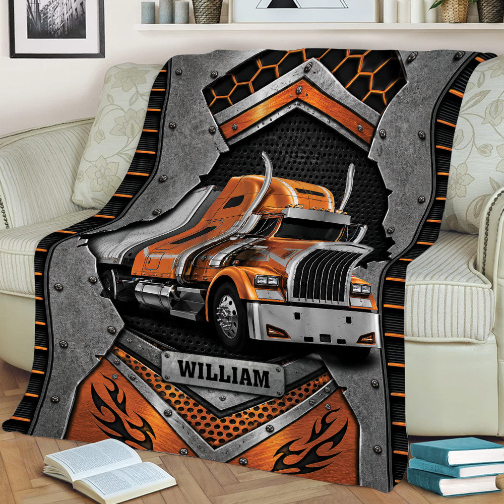 Close view of a Trucker blanket with bold orange big rig and industrial graphic artwork
