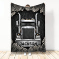 Trucker throw blanket featuring a chrome semi truck breaking through a rocky black background