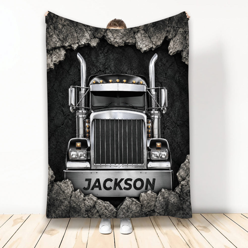 Trucker throw blanket featuring a chrome semi truck breaking through a rocky black background