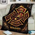 Firefighter throw blanket styled on a couch with a central fire service badge and bold rescue-themed artwork