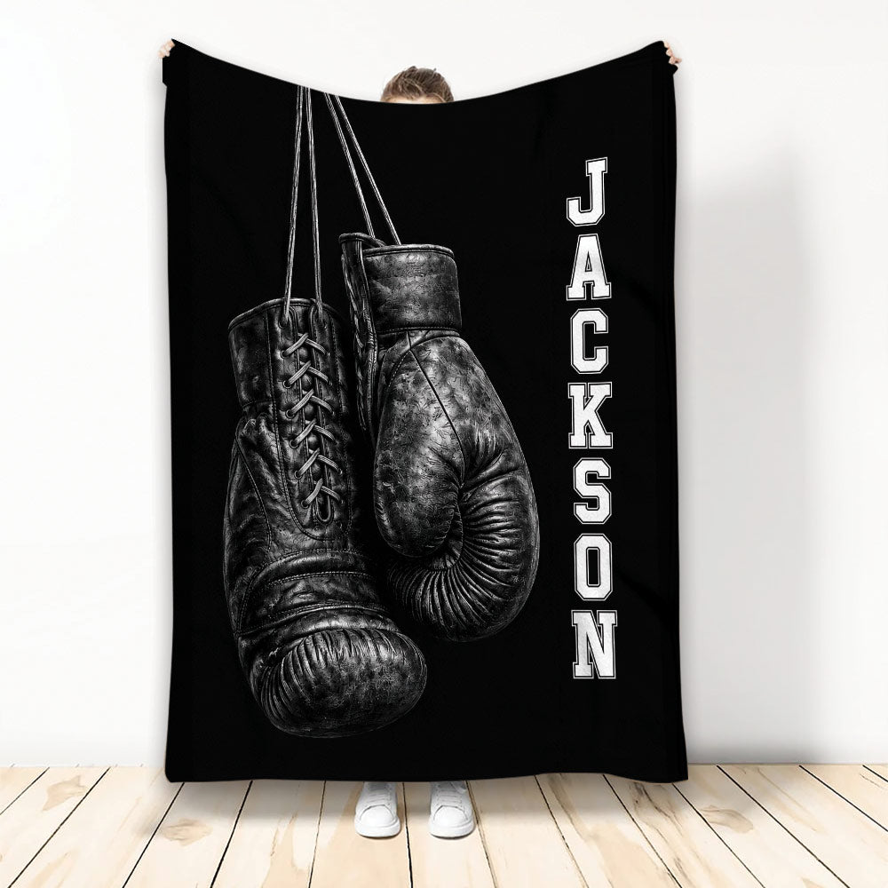 Black boxing throw blanket featuring detailed leather boxing gloves and bold monochrome sports artwork