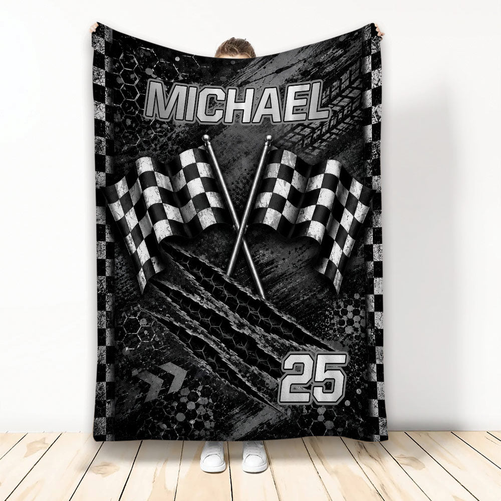 Black and white racing blanket with crossed checkered flags and bold motorsport graphics