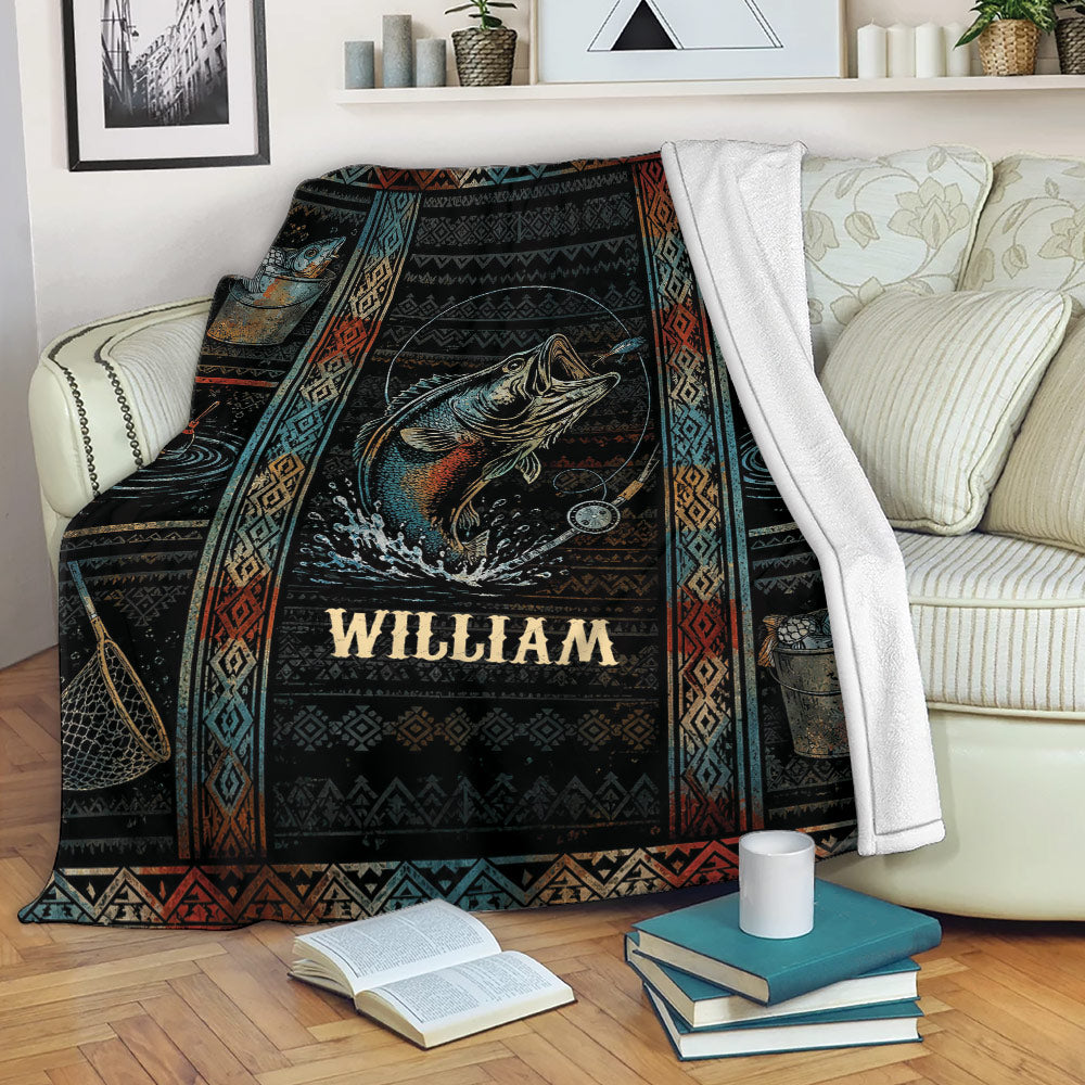 Fishing blanket draped over a sofa with fish, fishing gear, and dark southwestern-inspired artwork