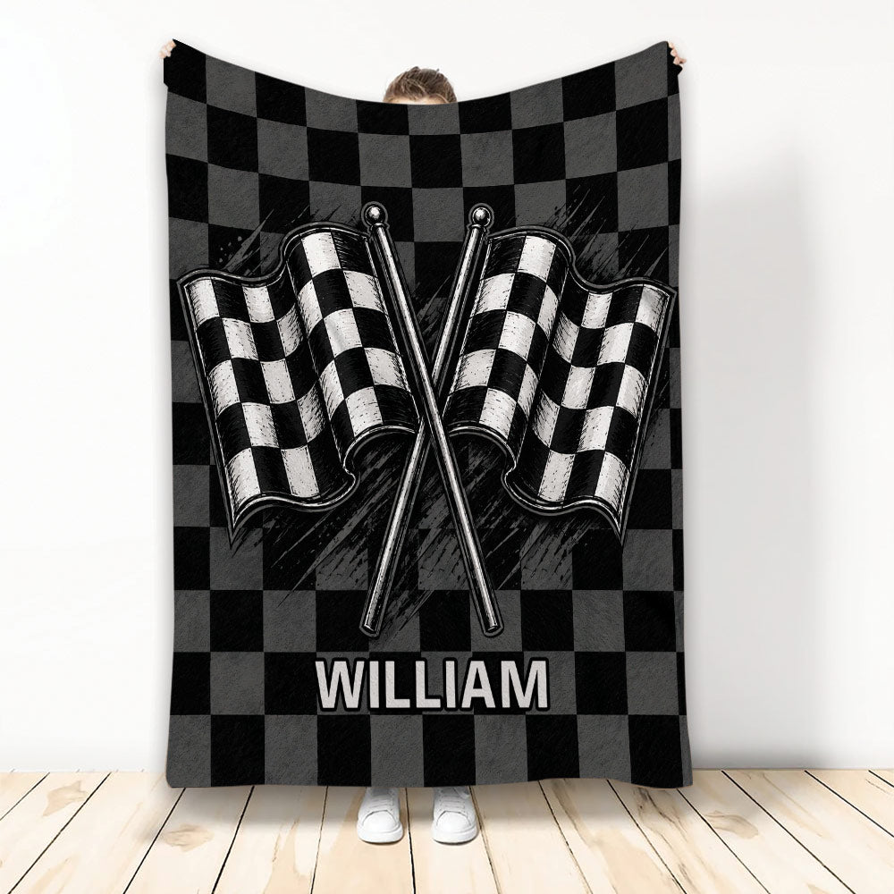 Racing throw blanket with crossed checkered flags and black and gray checkerboard artwork