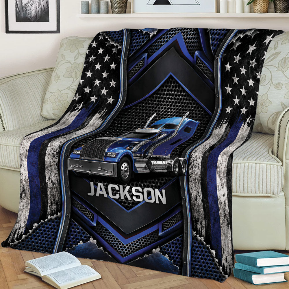 Blue semi-truck blanket displayed on a couch with star graphics, metallic textures, and bold industrial design