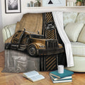 Trucker blanket displayed on a sofa with bold semi truck artwork and an industrial road-inspired design