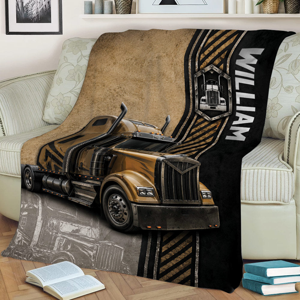 Custom trucker throw blanket draped over a sofa, showcasing a large semi truck and rugged industrial artwork