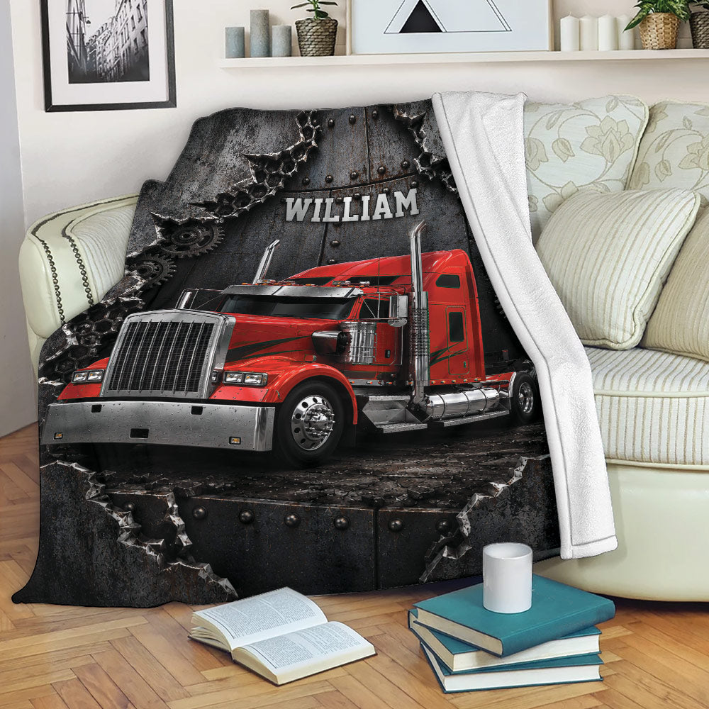 Red truck throw blanket displayed on a sofa with bold industrial trucking artwork
