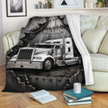 Trucker blanket displayed on a sofa with a detailed silver semi truck artwork