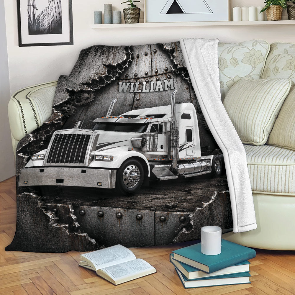 Trucker blanket displayed on a sofa with a detailed silver semi truck artwork