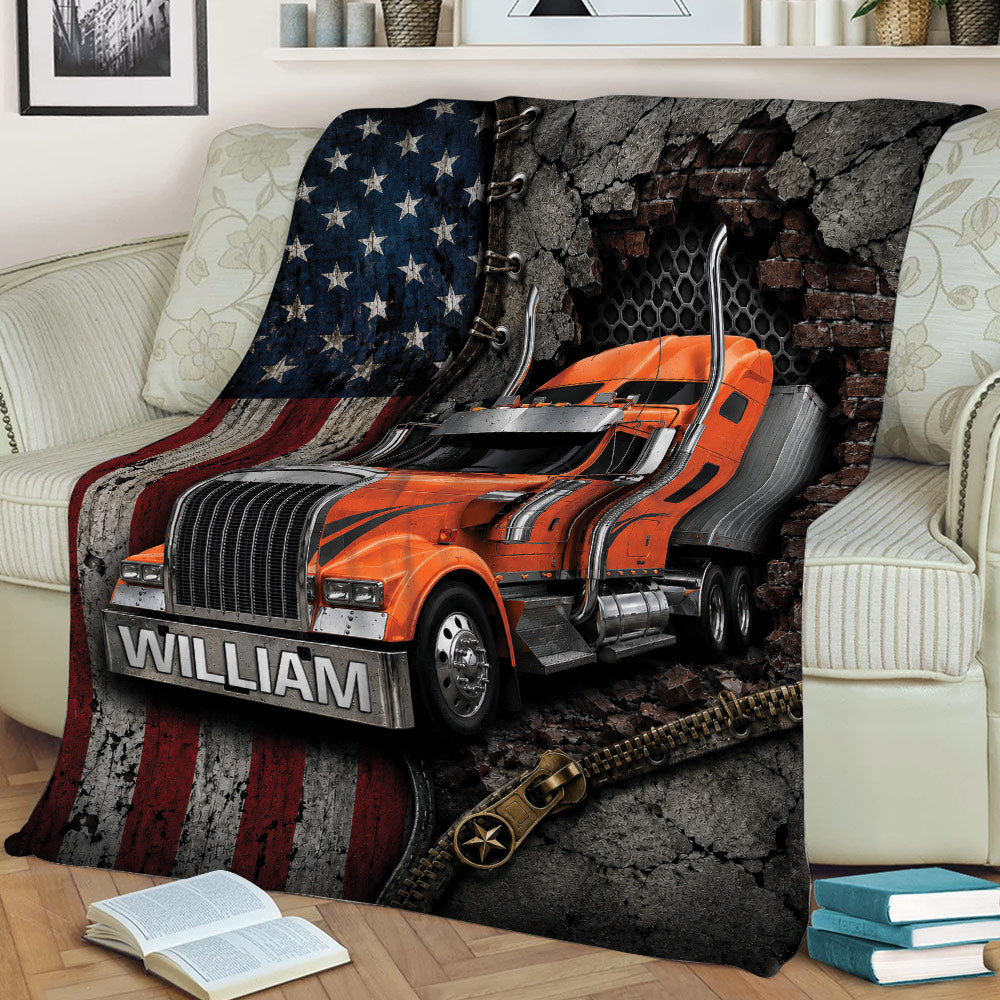 Large trucker throw blanket displayed across a sofa with bold orange semi truck and distressed patriotic artwork