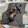 Long-haired Maine Coon cat throw blanket styled across a living room sofa