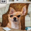Close-up Chihuahua throw blanket styled on a couch with realistic tan dog artwork and brown tones