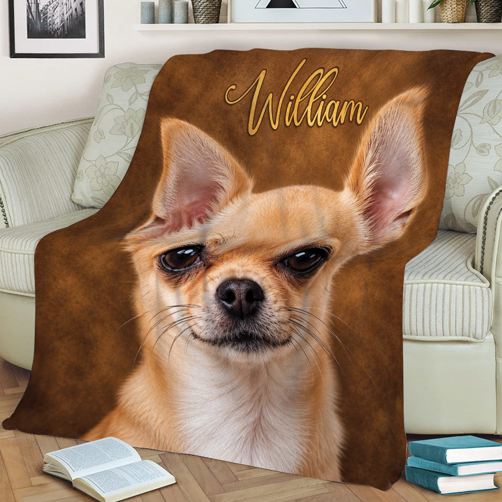 Close-up Chihuahua throw blanket styled on a couch with realistic tan dog artwork and brown tones