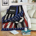 Police-themed throw blanket displayed on a sofa with thin blue line and distressed American flag design