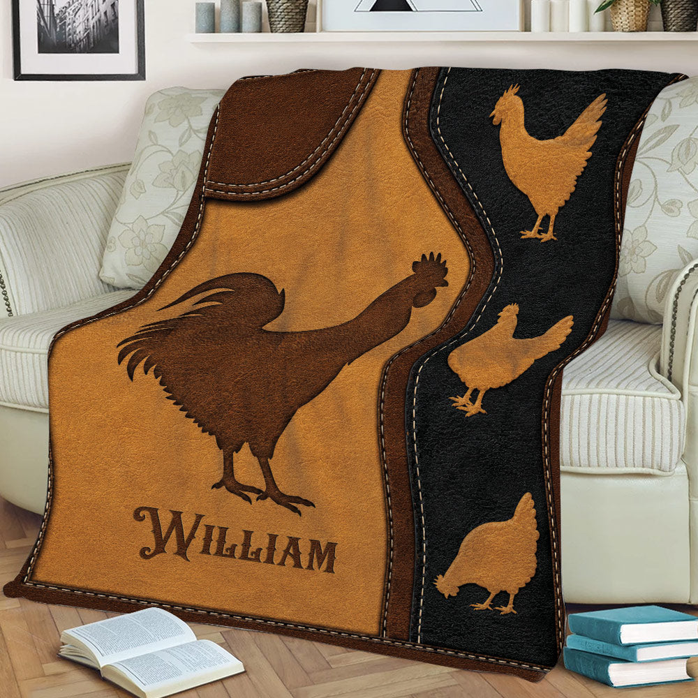Close lifestyle view of a chicken and rooster throw blanket draped over a couch in a rustic style
