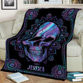 Decorative skull blanket featuring vibrant blue and purple artwork styled across a sofa