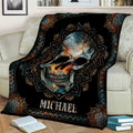 Decorative skull blanket draped over a couch with ornate geometric and mandala-inspired detailing