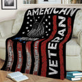 Patriotic military veteran blanket draped over a couch with dog tag artwork and bold tribute graphics