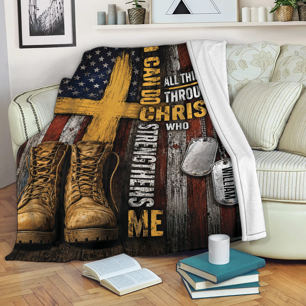 Veteran blanket displayed on a sofa with combat boots, dog tags, and distressed American flag design