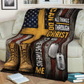 Patriotic veteran throw blanket draped over a sofa with military boots, dog tags, and cross artwork