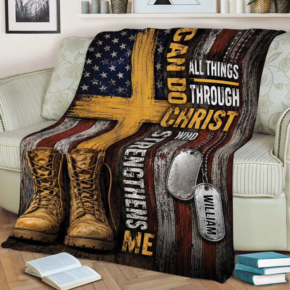 Patriotic veteran throw blanket draped over a sofa with military boots, dog tags, and cross artwork