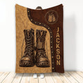 Veteran blanket displayed with rugged military boots, dog tags, patriotic details, and distressed leather-style artwork