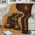 Rustic veteran throw blanket shown on a sofa with military boots, dog tags, and patriotic military artwork