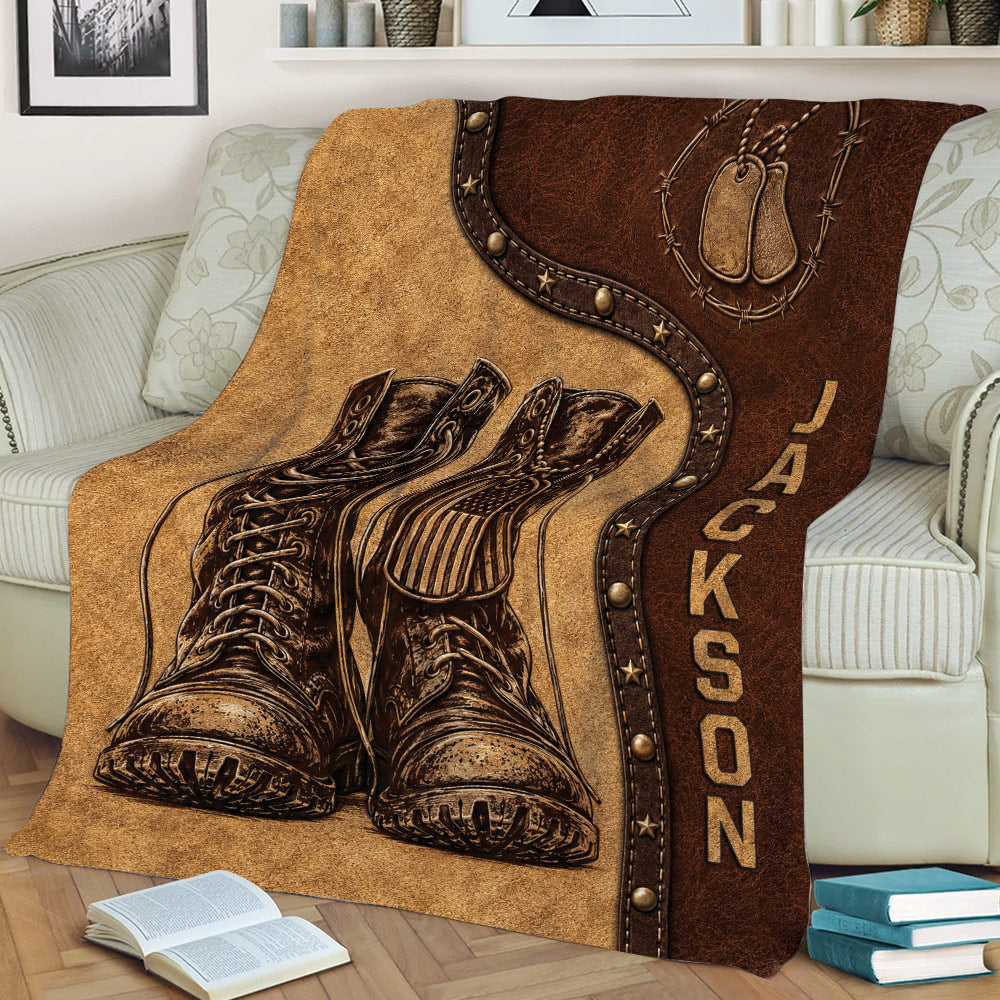 Rustic veteran throw blanket shown on a sofa with military boots, dog tags, and patriotic military artwork