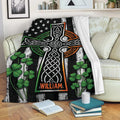 Irish Celtic throw blanket displayed on a sofa with shamrocks and knotwork design