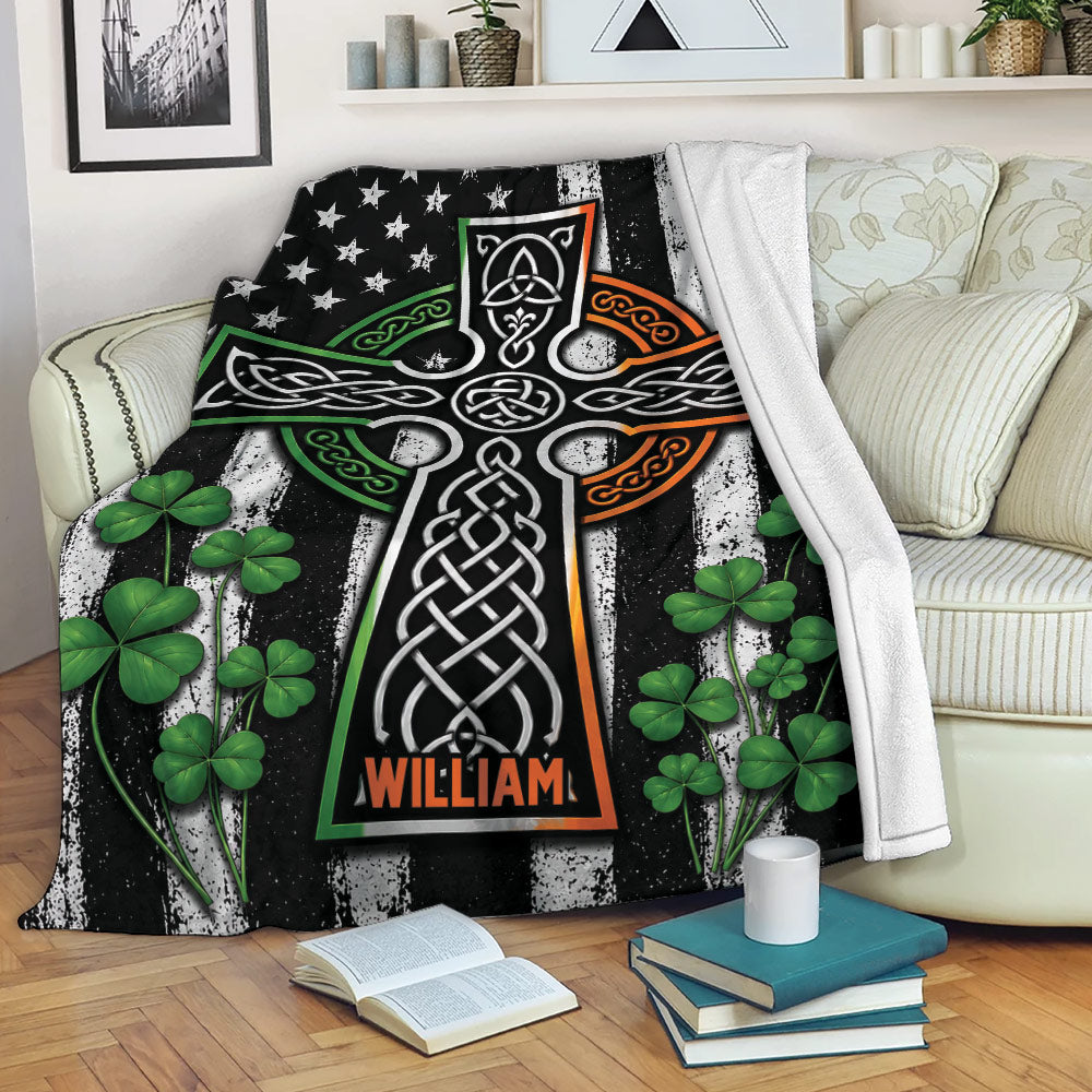 Irish Celtic throw blanket displayed on a sofa with shamrocks and knotwork design